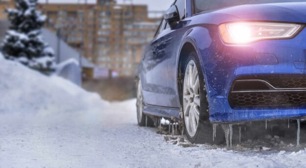 starting engine and warming up the icy car in severe frosts in w